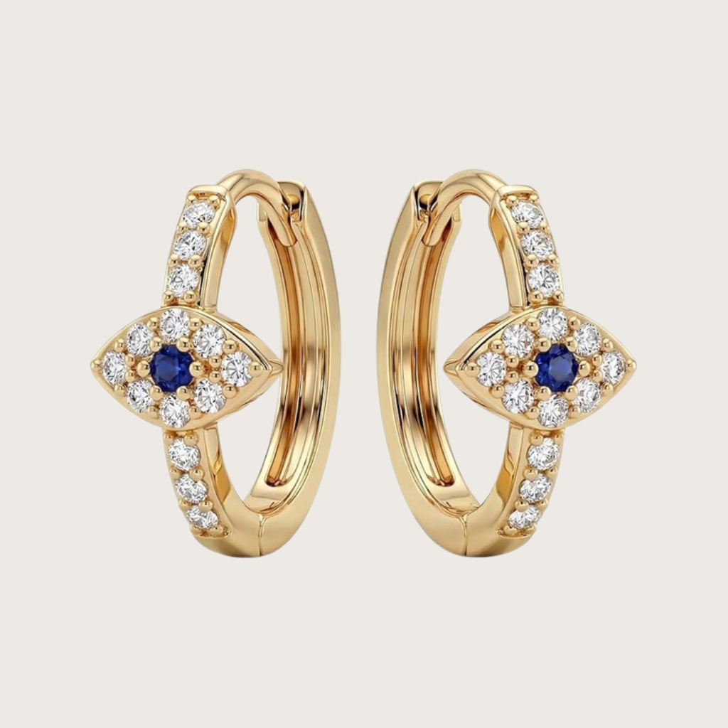 Gold hoop earrings with blue gemstones and clear stones 