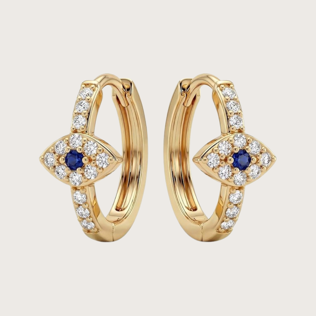 Gold hoop earrings with blue gemstones and clear stones 
