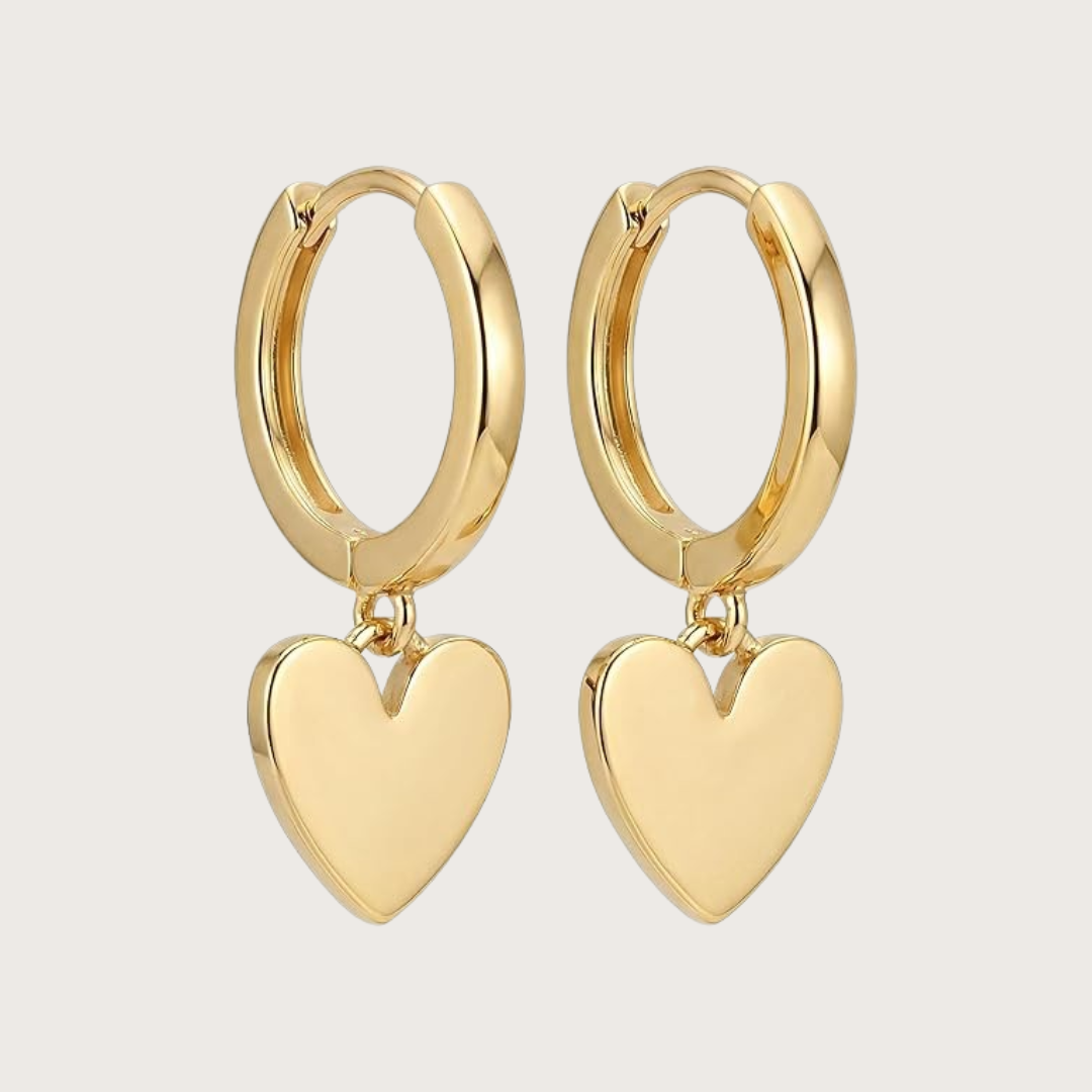 Gold hoop earrings with heart-shaped pendants 