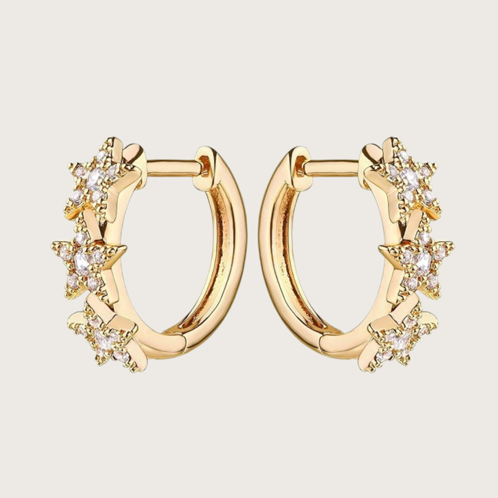 Gold hoop earrings with star-shaped designs 