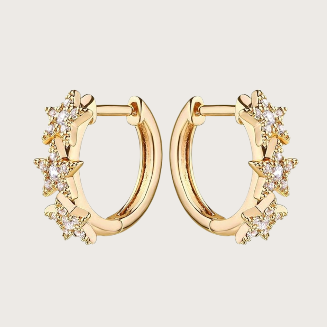 Gold hoop earrings with star-shaped designs 